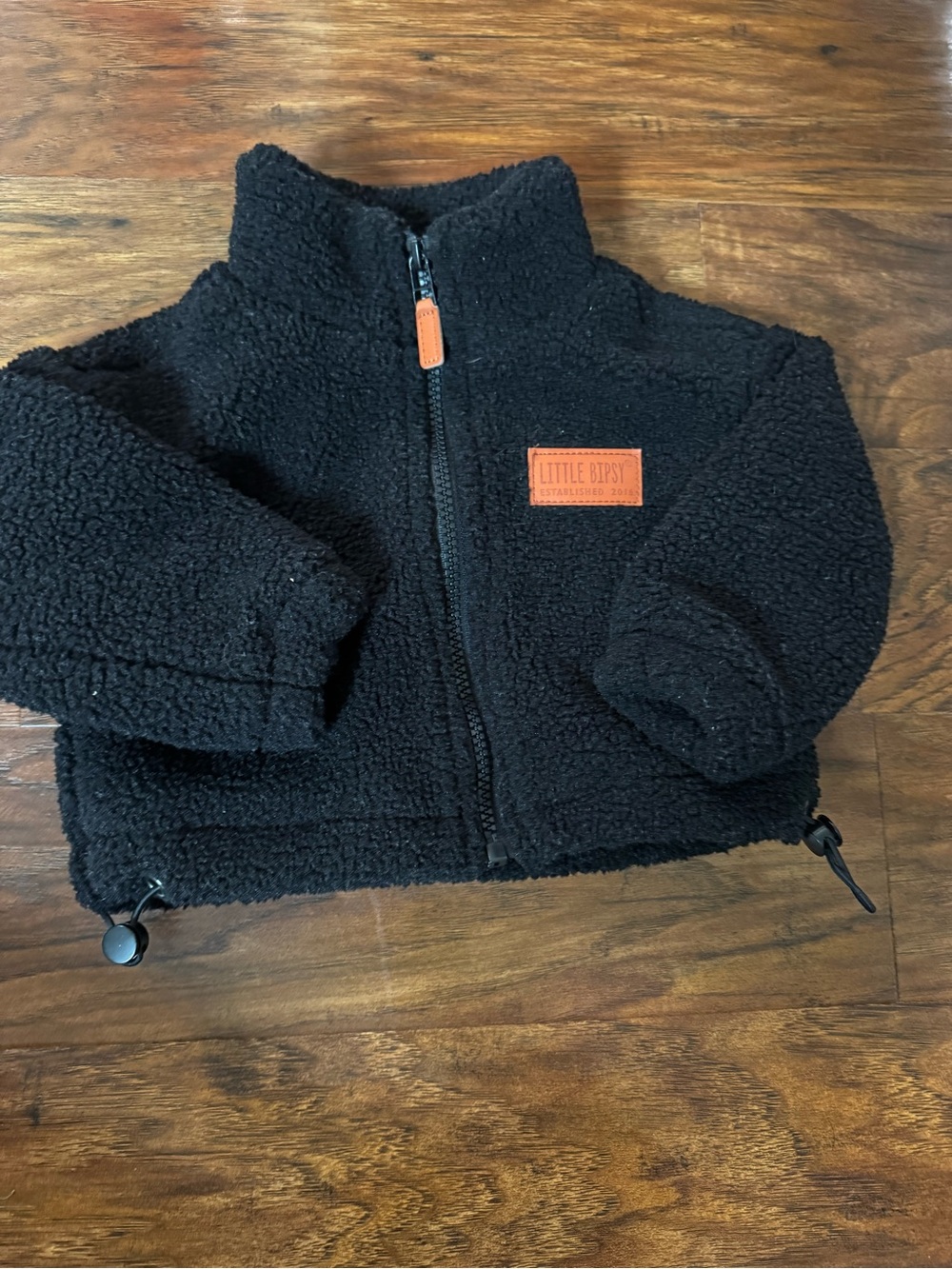 Little Bipsy Black Sherpa Jacket with Tan Patch